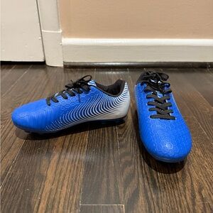 Cobalt blue and white Vizari cleats for soccer or football.